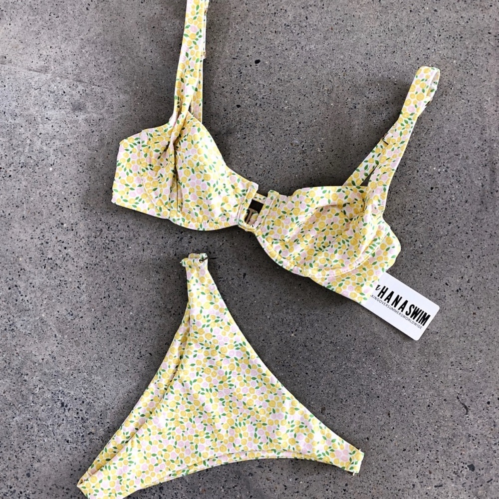 Bikini 3 pieces, 2 tops and 1 bottom in cute yellow floral print. New with tags!